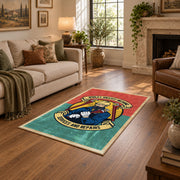 Vintage biker badge area rug in coral and teal with a motorcycle-inspired design, design detail view