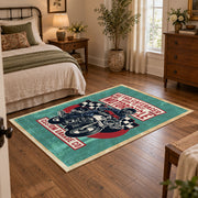 Motorcycle repair graphic area rug in teal, red, black, and cream, soft surface detail