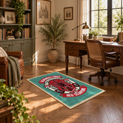 Skull motorcycle emblem area rug in red, teal, coral, and black, featured room view