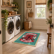 Skull motorcycle emblem area rug in red, teal, coral, and black, design detail view