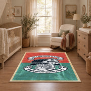 Vintage motorcycle mechanic area rug in teal, red, black, and cream, full pattern view