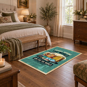 Retro camper travel area rug in teal, yellow, orange, and cream, cozy home setting