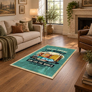 Retro camper travel area rug in teal, yellow, orange, and cream, design detail view