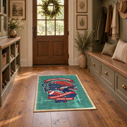 American football helmet area rug in teal, red, navy, and white, wide interior view