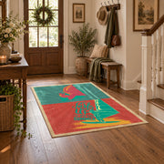 Retro mushroom graphic area rug in coral, teal, yellow, and pink, close decorative detail