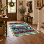 Vintage motorcycle graphic area rug in teal, red, cream, and black, featured room view