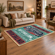 Vintage motorcycle graphic area rug in teal, red, cream, and black, angled room view