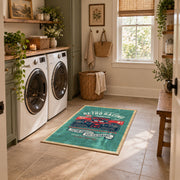 Classic muscle car area rug in teal, red, black, and cream, featured room view