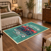 Classic muscle car area rug in teal, red, black, and cream, soft surface detail