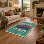 Classic muscle car area rug in teal, red, black, and cream, design detail view