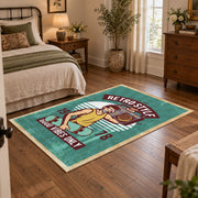 Retro electronics repair area rug in teal, cream, yellow, and burgundy, soft surface detail
