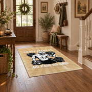 Vintage bodybuilding area rug in beige, black, white, and gold, close decorative detail
