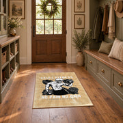 Vintage bodybuilding area rug in beige, black, white, and gold, wide interior view