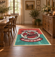 Soccer player emblem area rug in red, teal, cream, and black, front room mockup