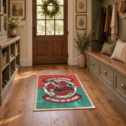 Soccer player emblem area rug in red, teal, cream, and black, wide interior view