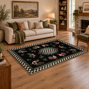 Vintage rooster floral area rug with a black and white checkerboard border, angled room view