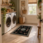 Vintage rooster floral area rug with a black and white checkerboard border, wide interior view