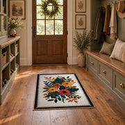 Autumn wildflower bouquet area rug in orange, yellow, teal, and cream, front room mockup