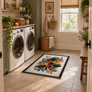 Autumn wildflower bouquet area rug in orange, yellow, teal, and cream, wide interior view