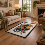 Autumn wildflower bouquet area rug in orange, yellow, teal, and cream, design detail view