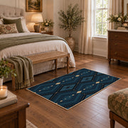 Navy geometric diamond area rug in deep blue, black, and beige, cozy home setting