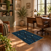 Navy geometric diamond area rug in deep blue, black, and beige, complete product view
