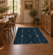 Navy geometric diamond area rug in deep blue, black, and beige, close decorative detail