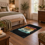 Knitting yarn quote area rug in black with coral, teal, yellow, and cream accents, cozy home setting