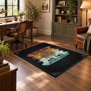 Knitting yarn quote area rug in black with coral, teal, yellow, and cream accents, soft surface detail