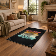 Knitting yarn quote area rug in black with coral, teal, yellow, and cream accents, design detail view