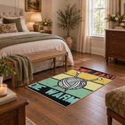 Retro knitting yarn area rug in yellow, mint, coral, black, and cream, cozy home setting