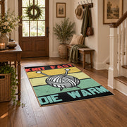 Retro knitting yarn area rug in yellow, mint, coral, black, and cream, wood floor styling