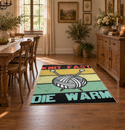Retro knitting yarn area rug in yellow, mint, coral, black, and cream, close decorative detail