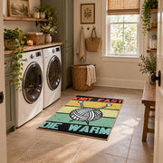 Retro knitting yarn area rug in yellow, mint, coral, black, and cream, wide interior view