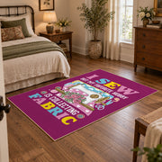 Colorful sewing machine area rug in magenta, yellow, teal, and pink, soft surface detail
