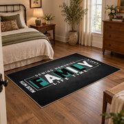 Funny family typography area rug in black, white, and teal, soft surface detail