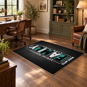 Funny family typography area rug in black, white, and teal, wood floor styling