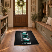 Funny family typography area rug in black, white, and teal, wide interior view