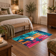 Sunset palm tree area rug in pink, teal, orange, navy, and cream, cozy home setting