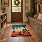 California beach typography area rug in teal, orange, cream, and black, wide interior view