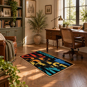 California palm collage area rug in black, orange, teal, yellow, and red, complete product view