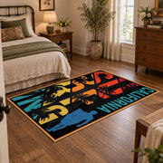 California palm collage area rug in black, orange, teal, yellow, and red, soft surface detail