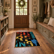 California palm collage area rug in black, orange, teal, yellow, and red, wide interior view