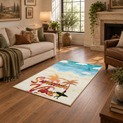 Sunny beach surfboard area rug in aqua, cream, coral, and tan, design detail view