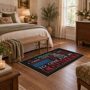 Brother veteran tribute area rug in black, red, cream, and teal, cozy home setting