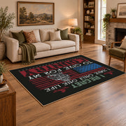 Brother veteran tribute area rug in black, red, cream, and teal, angled room view