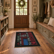 Brother veteran tribute area rug in black, red, cream, and teal, front room mockup