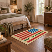 American flag tribute area rug in beige, red, blue, and cream, featured room view