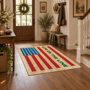 American flag tribute area rug in beige, red, blue, and cream, close decorative detail