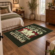 Veteran homecoming tribute area rug in black, red, cream, and green, soft surface detail
